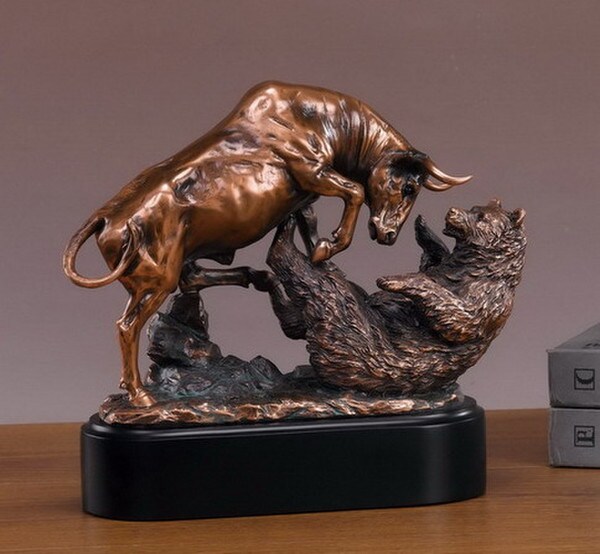 classic battle of the bull and bear in a fierce fight scene sculpture